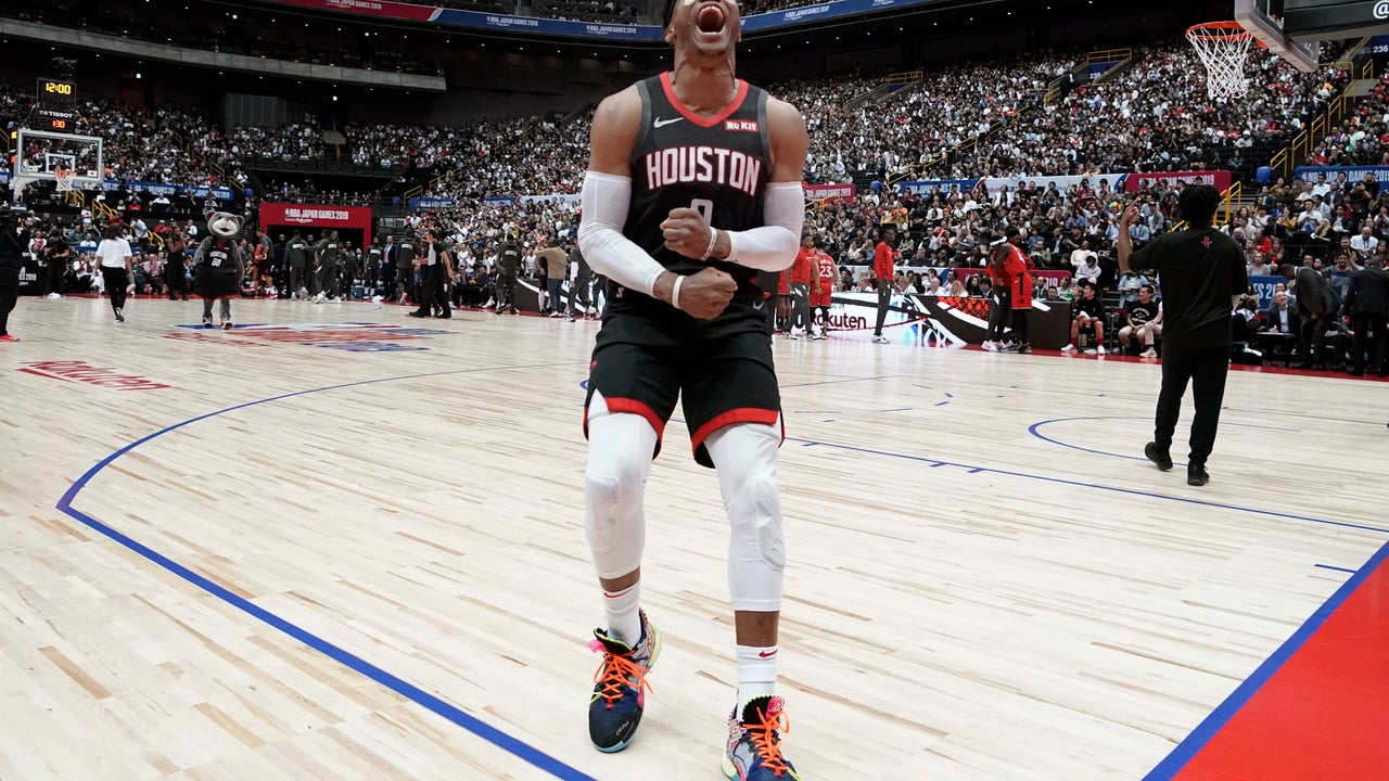 Irving aggravates injury, Nets hold off Lakers in Shanghai